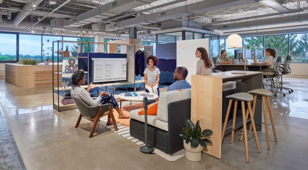 workers collaborating in an open office space