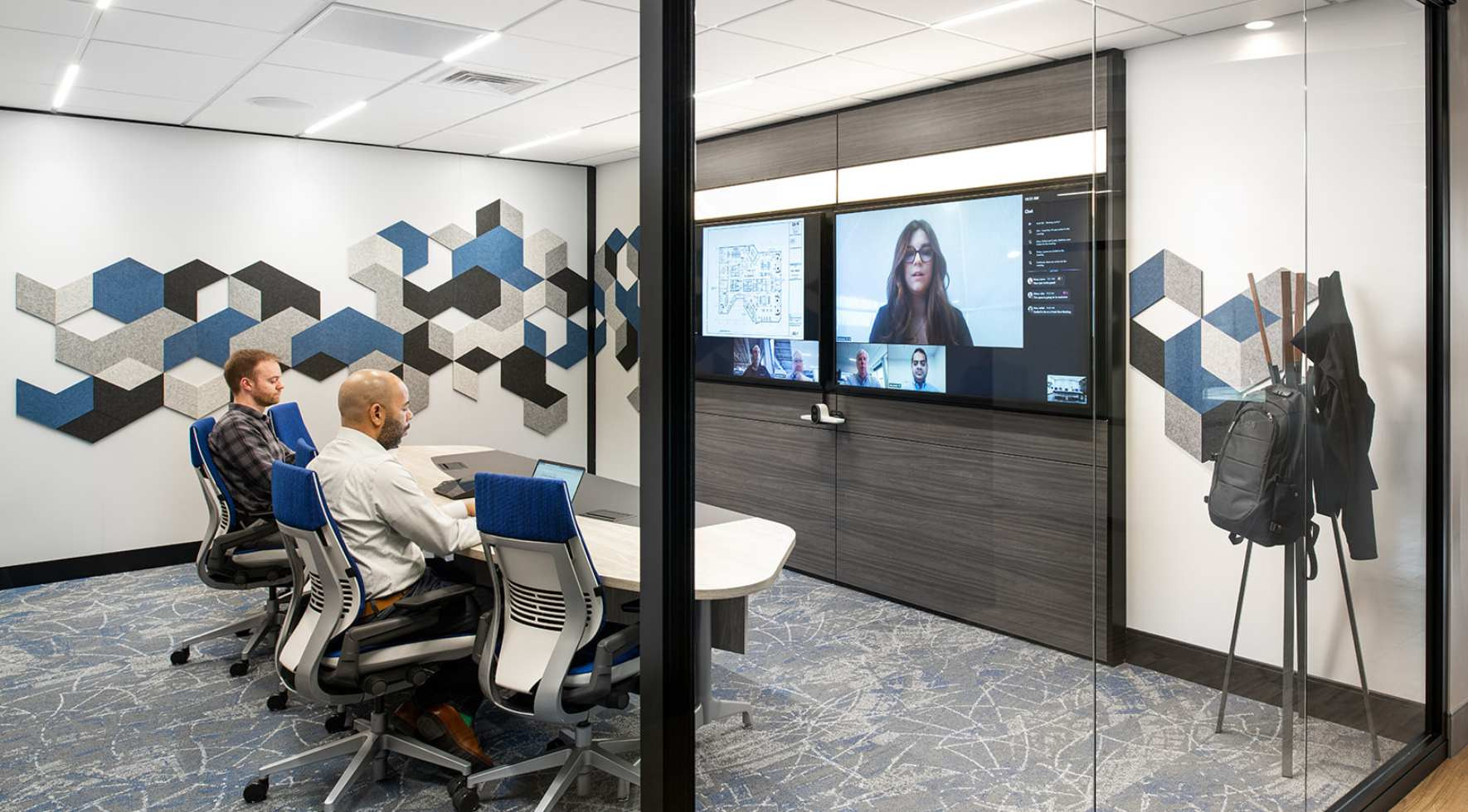 image of workers in a microsoft signature teams room